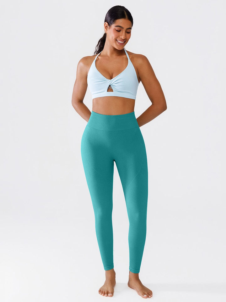 A model wearing a BRXL® Seamless Butt Scrunch Spandx Leggings With Tummy Control in