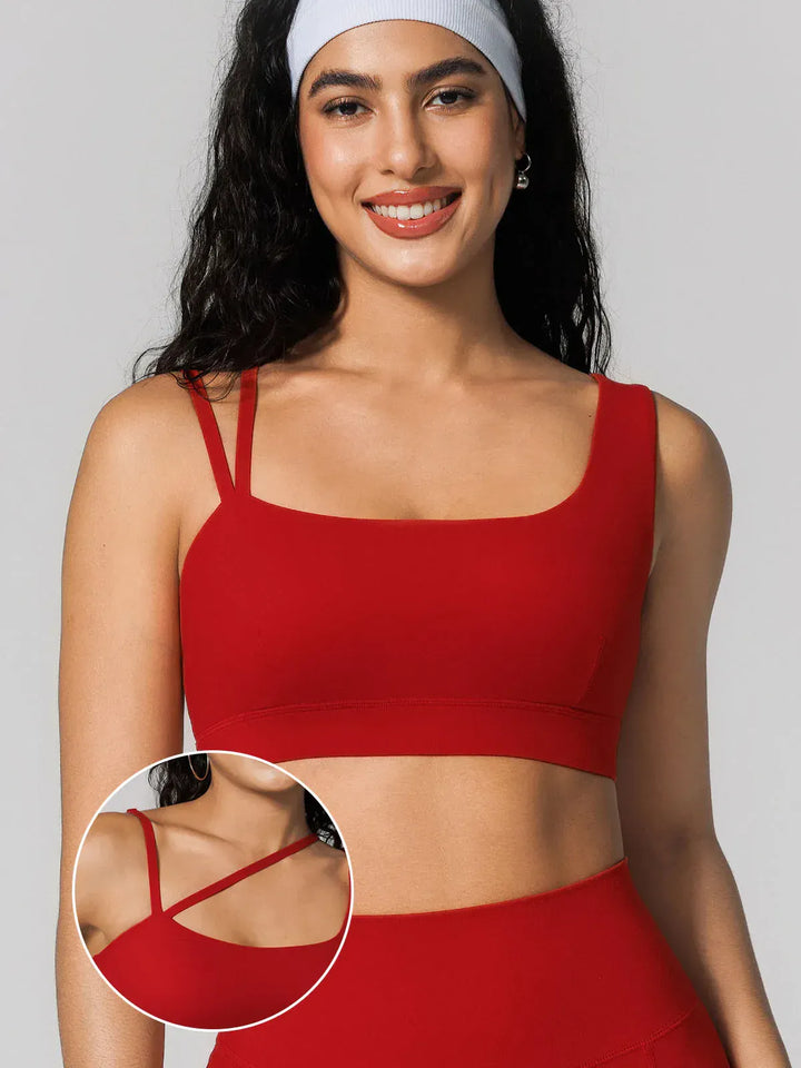 A model wearing a BRXL® Seamless Dual Style Square Neckline Sports Bra
