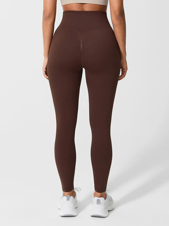 A model wearing a BRXL® Seamless High Waisted Butt-Lifting Leggings in