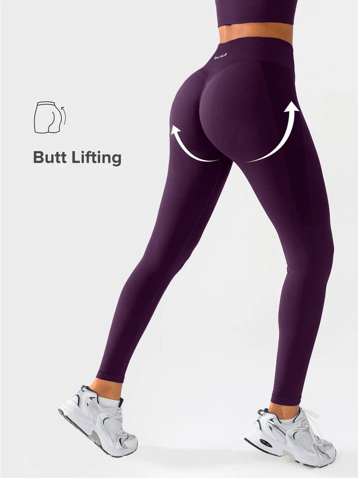 A model wearing a BRXL® Seamless High Waisted Butt-Lifting Leggings,Half Front Zipper Activewear Cropped Top in