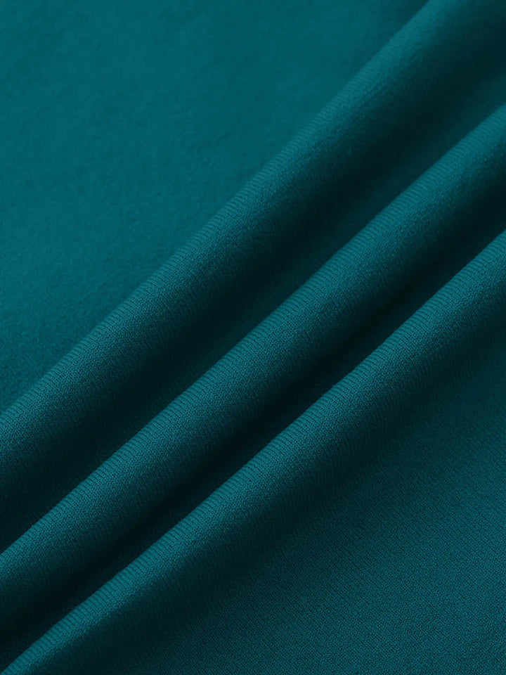 A model wearing a BRXL® Seamless High Waisted Tummy Control Butt-Lifting Leggings in