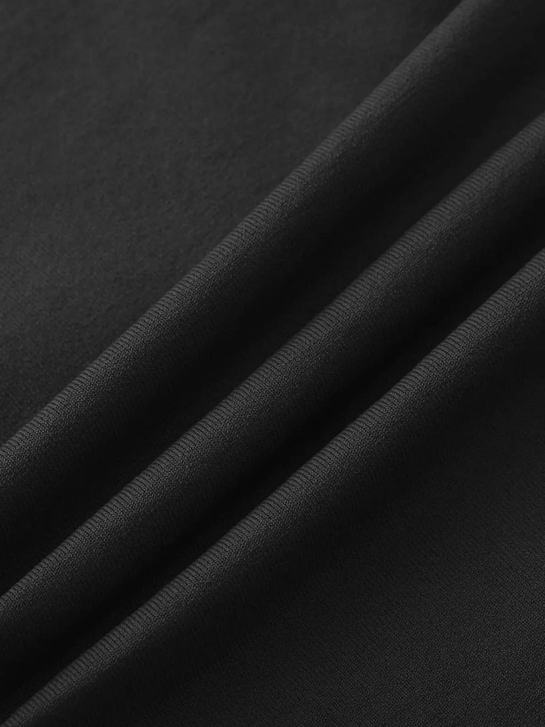 A model wearing a BRXL® Seamless High Waisted Tummy Control Butt-Lifting Leggings,Half Front Zipper Activewear Cropped Top in