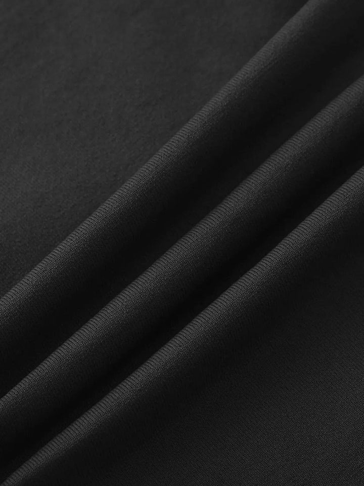 A model wearing a BRXL® Seamless High Waisted Tummy Control Butt-Lifting Leggings,Half Front Zipper Activewear Cropped Top in