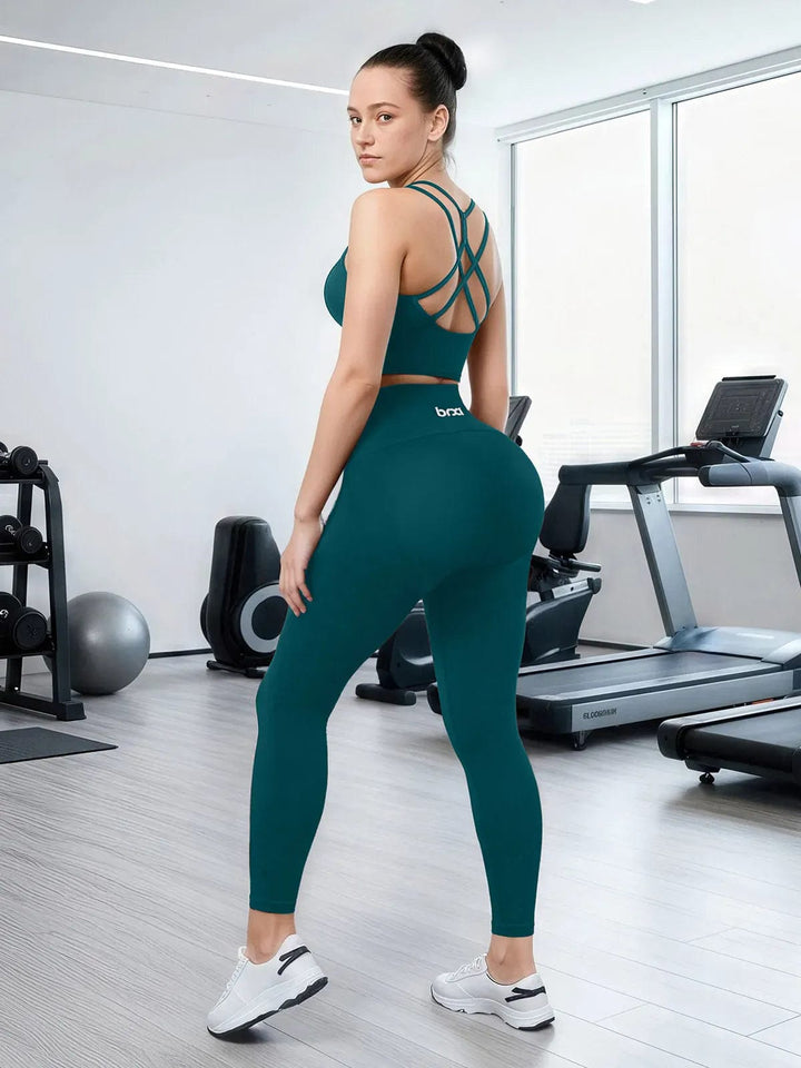 A model wearing a BRXL® Seamless High Waisted Tummy Control Butt-Lifting Leggings,Half Front Zipper Activewear Cropped Top in