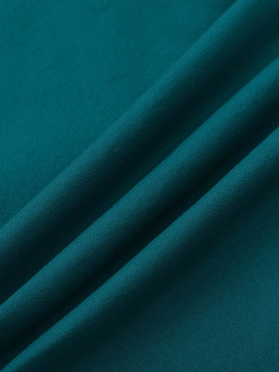 A model wearing a BRXL® Seamless High Waisted Tummy Control Butt-Lifting Leggings,Half Front Zipper Activewear Cropped Top in