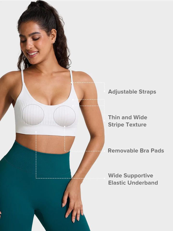 A model wearing a BRXL® Seamless Scoop Ribbed Sports Bra