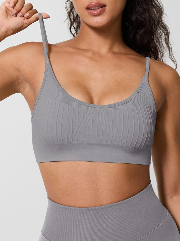 A model wearing a BRXL® Seamless Scoop Ribbed Sports Bra