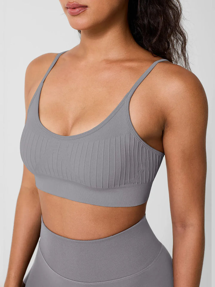 A model wearing a BRXL® Seamless Scoop Ribbed Sports Bra