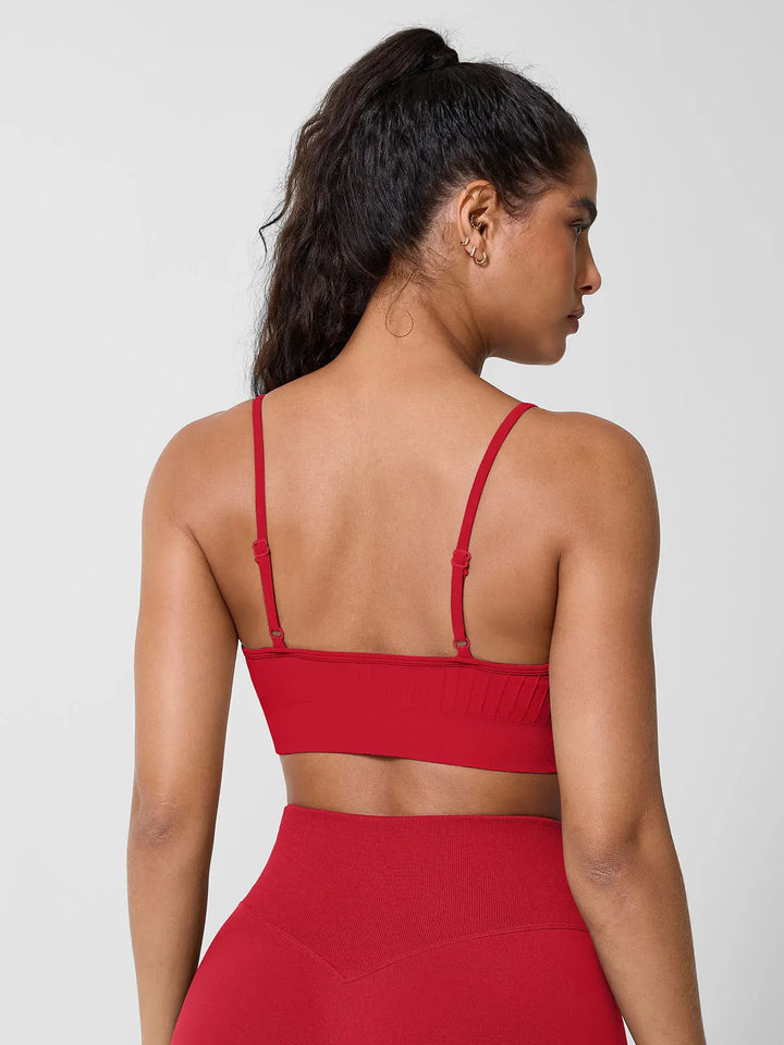 A model wearing a BRXL® Seamless Scoop Ribbed Sports Bra