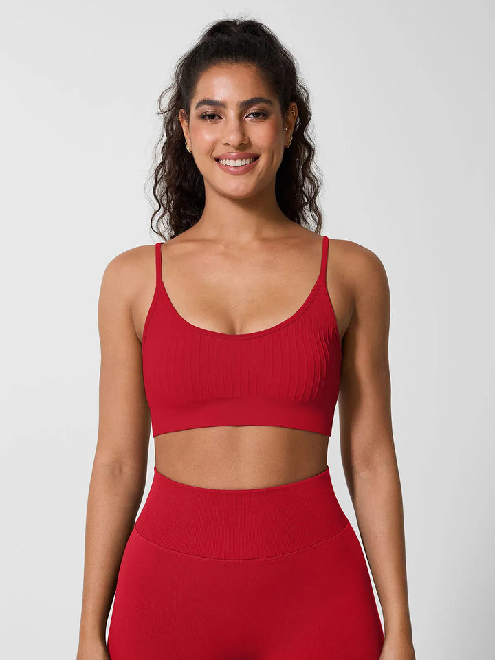 A model wearing a BRXL® Seamless Scoop Ribbed Sports Bra