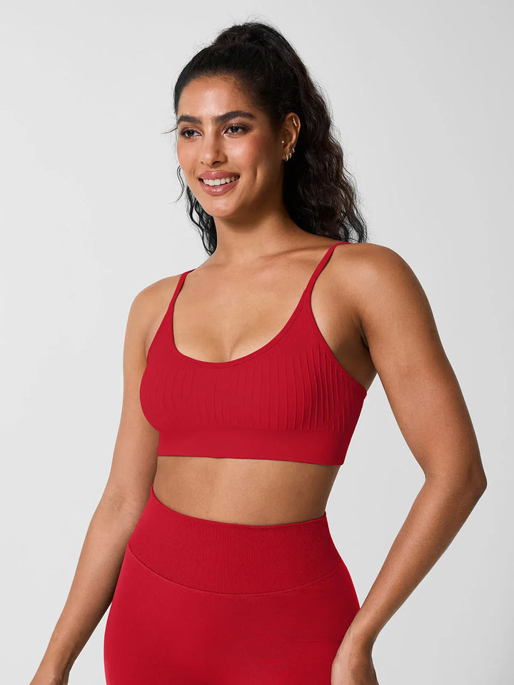 A model wearing a BRXL® Seamless Scoop Ribbed Sports Bra
