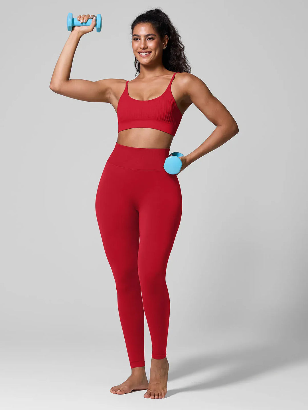A model wearing a BRXL® Seamless Scoop Ribbed Sports Bra