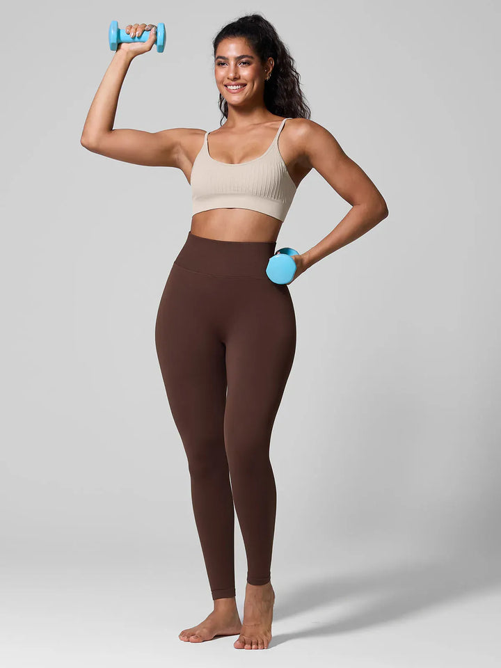 A model wearing a BRXL® Seamless Scoop Ribbed Sports Bra