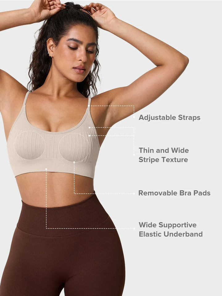 A model wearing a BRXL® Seamless Scoop Ribbed Sports Bra