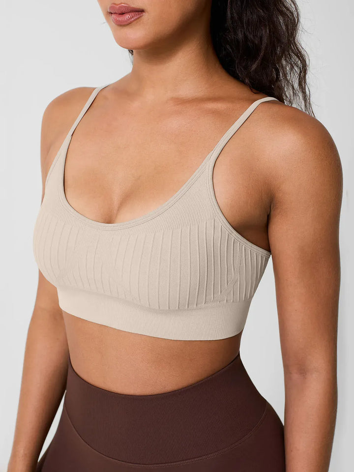A model wearing a BRXL® Seamless Scoop Ribbed Sports Bra