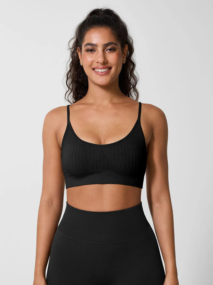 A model wearing a BRXL® Seamless Scoop Ribbed Sports Bra