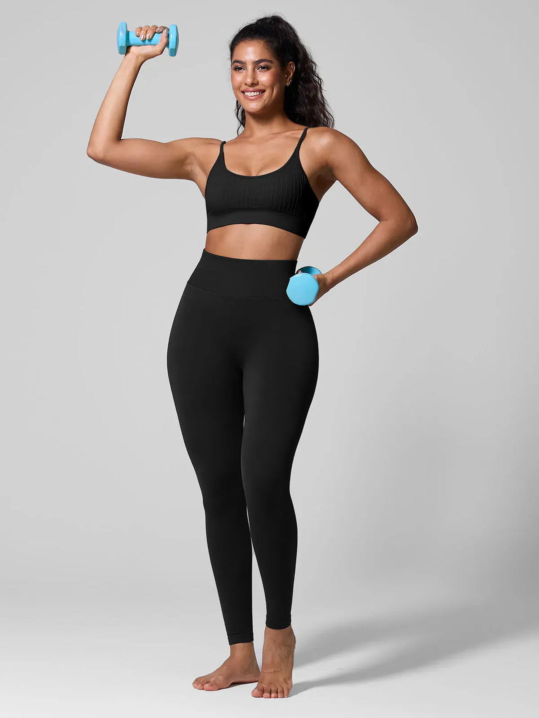 A model wearing a BRXL® Seamless Scoop Ribbed Sports Bra
