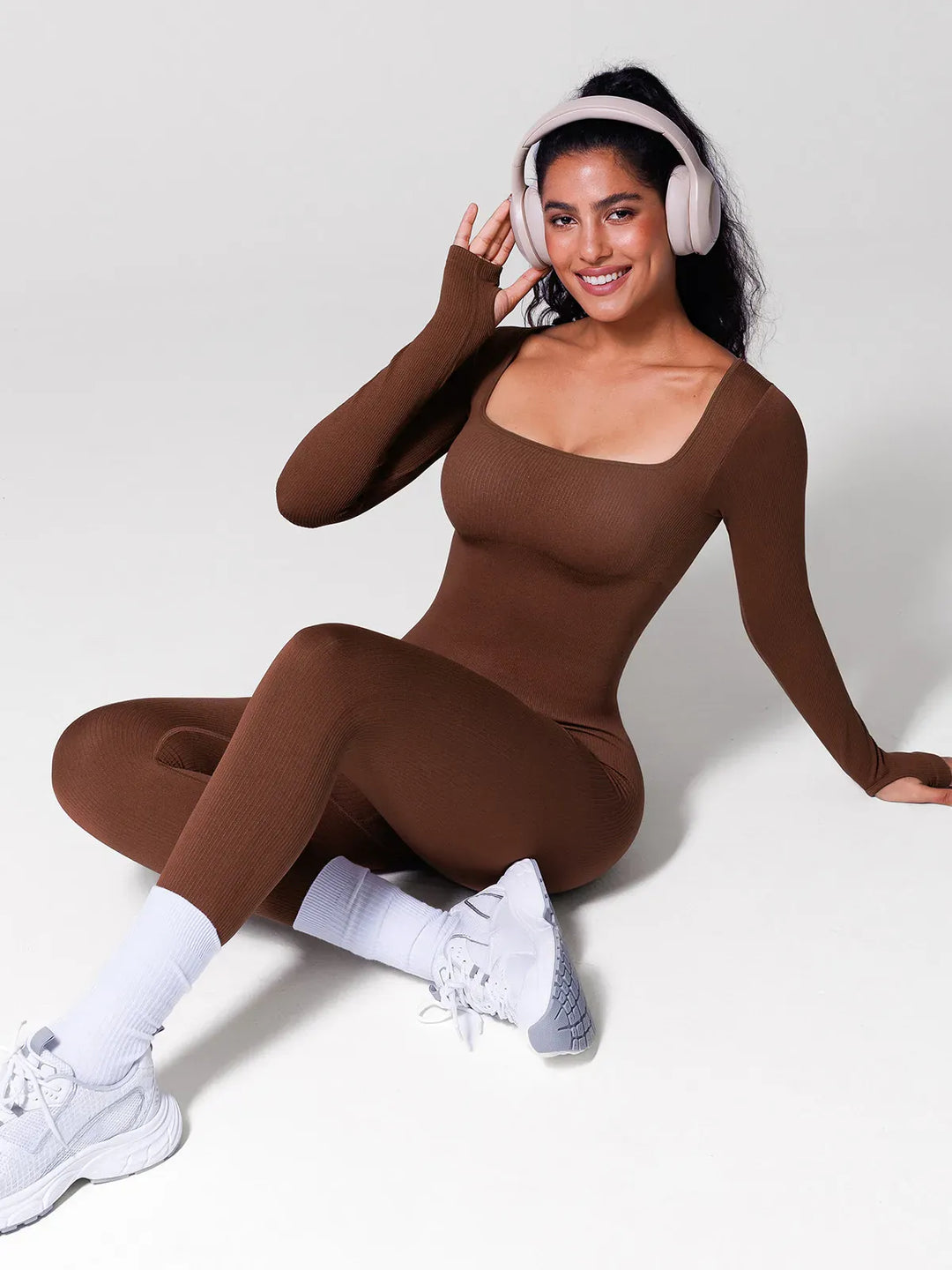 A model wearing a BRXL® Seamless Square Neck Tummy Control Jumpsuits in