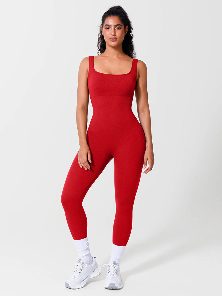 A model wearing a BRXL® Seamless Square Neck Tummy Control Jumpsuits in Tank / Red / S