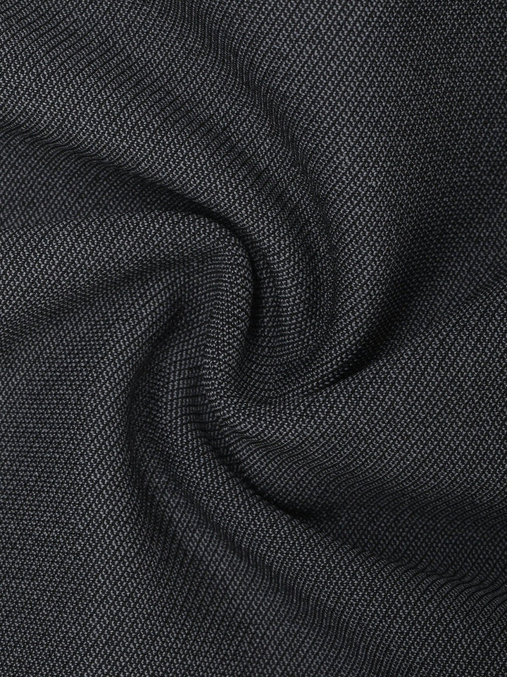 Close-up of dark grey textured denim fabric with subtle weave pattern.