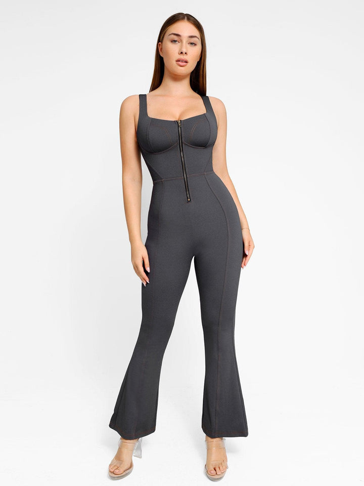 Sculpting denim jumpsuit with square neckline, zipper front, and flare legs.