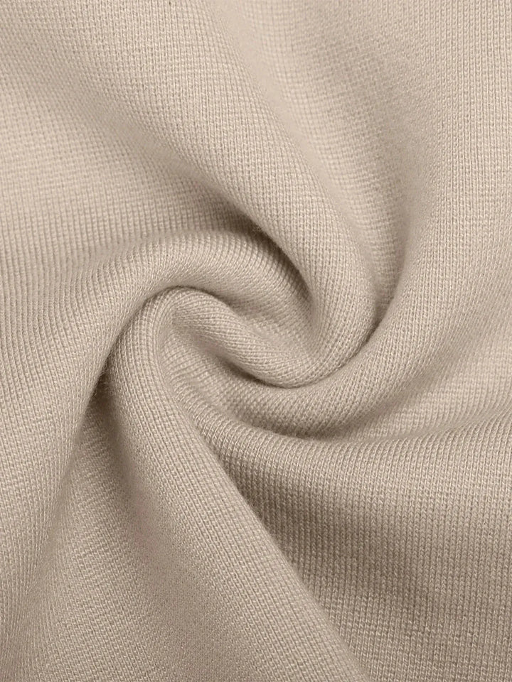 A model wearing a BRXL® Shapewear Freedom Tummy Control Ponte Flare-Leg Pants in