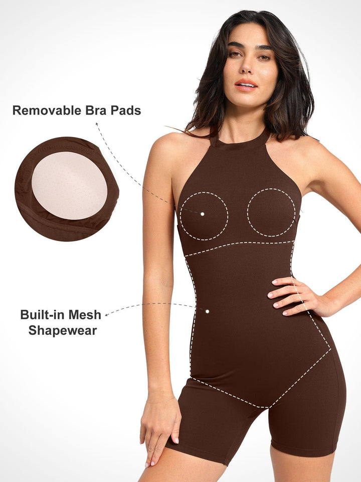A model wearing a BRXL® Shapewear Sculpting Cutaway Halter Romper in