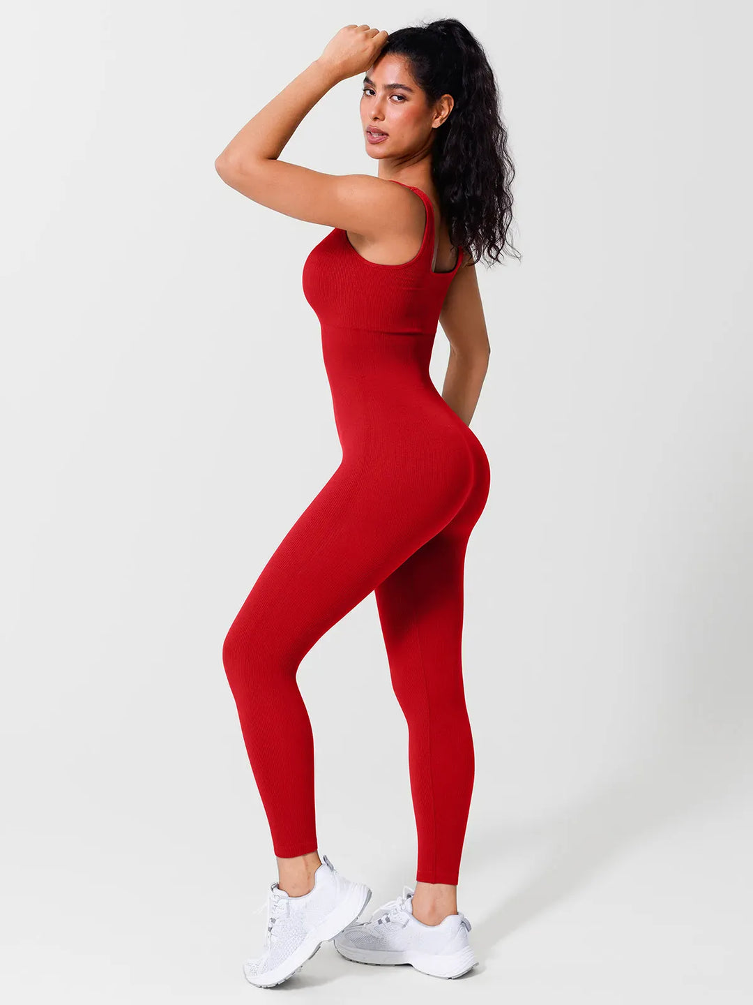 A model wearing a BRXL® Yoga Activewear Jumpsuit Shapewear Seamless Square Neck Tank Workout Jumpsuit in