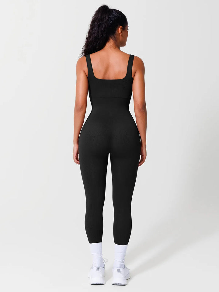 A model wearing a BRXL® Yoga Activewear Jumpsuit Shapewear Seamless Square Neck Tank Workout Jumpsuit in