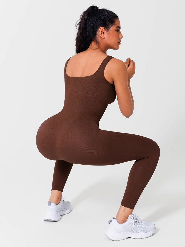 A model wearing a BRXL® Yoga Activewear Jumpsuit Shapewear Seamless Square Neck Tank Workout Jumpsuit in