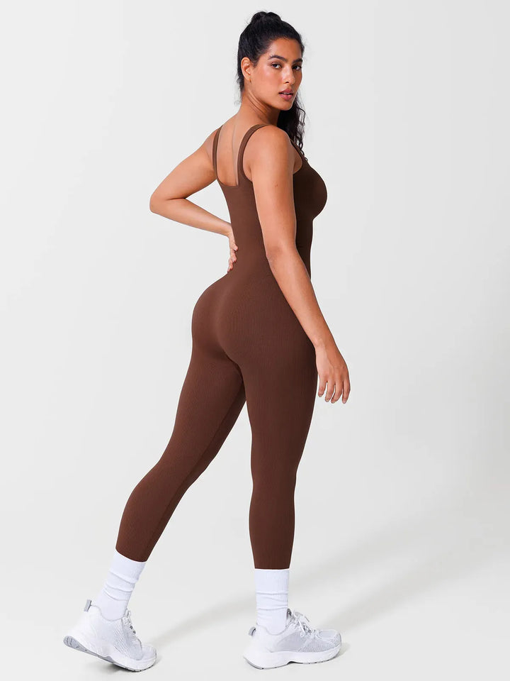 A model wearing a BRXL® Yoga Activewear Jumpsuit Shapewear Seamless Square Neck Tank Workout Jumpsuit in