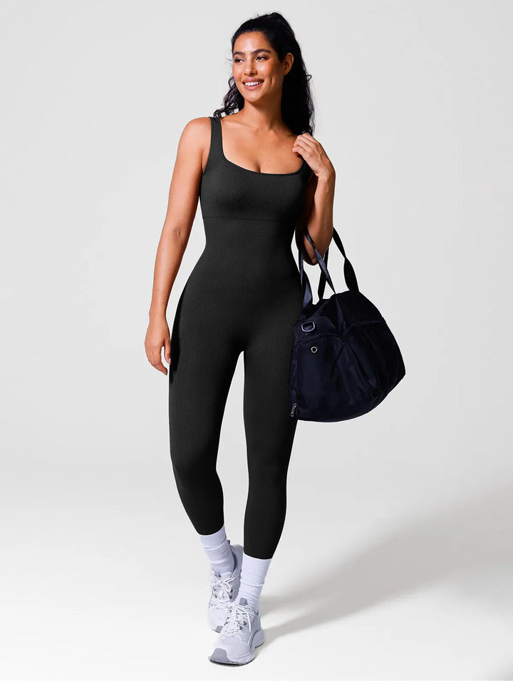 A model wearing a BRXL® Yoga Activewear Jumpsuit Shapewear Seamless Square Neck Tank Workout Jumpsuit in