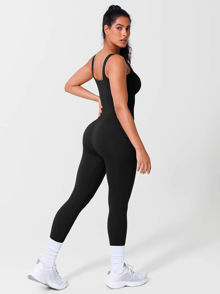 A model wearing a BRXL® Yoga Activewear Jumpsuit Shapewear Seamless Square Neck Tank Workout Jumpsuit in