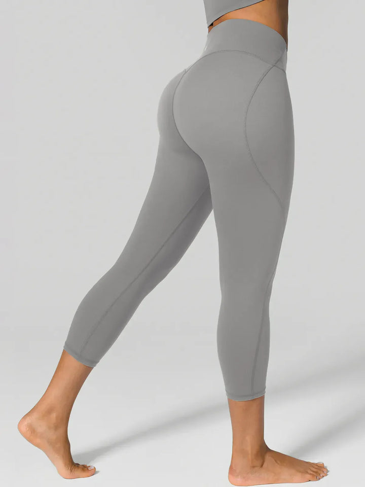 A model wearing a BRXL® Shapewear Yoga 7/8  Leggings in