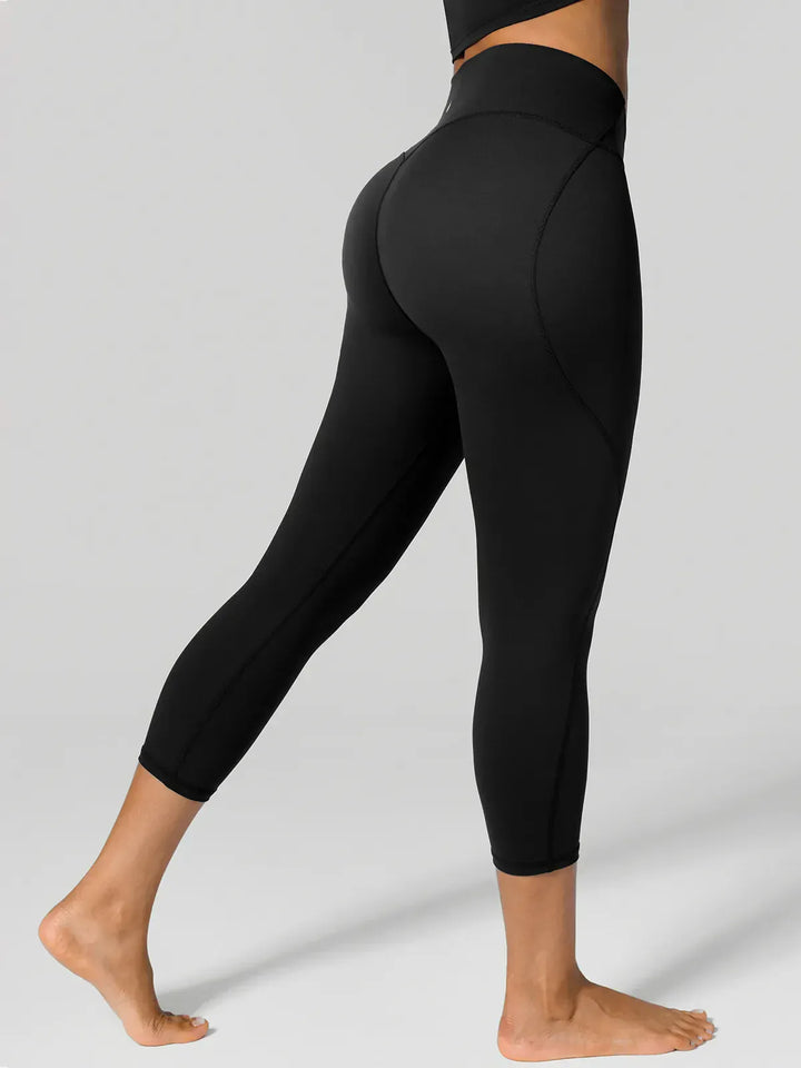 A model wearing a BRXL® Shapewear Yoga 7/8  Leggings in