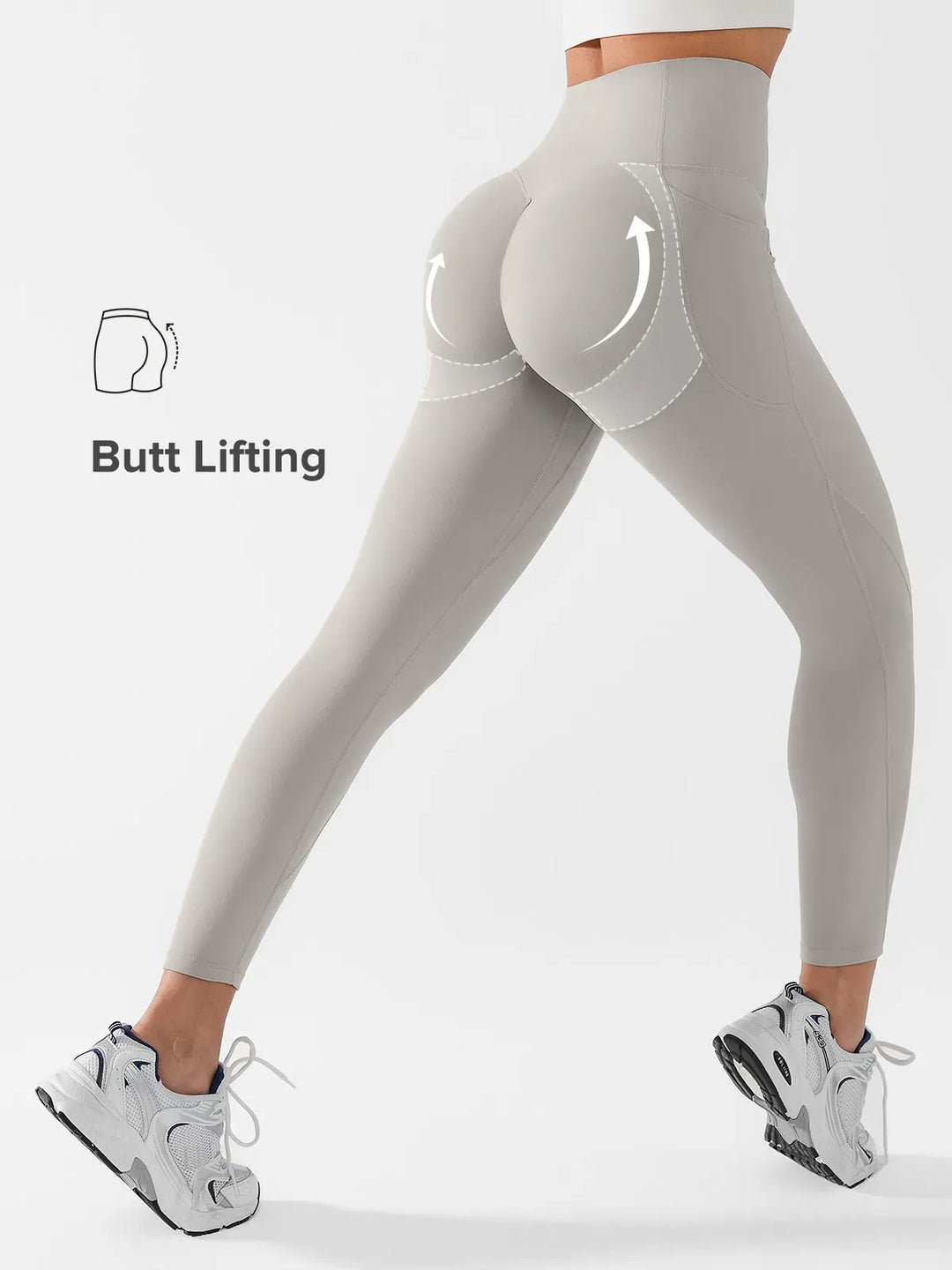 A model wearing a BRXL® Side Pocket Butt-Lift Leggings in