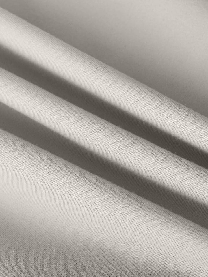 A model wearing a BRXL® Side Pocket Butt-Lift Leggings in