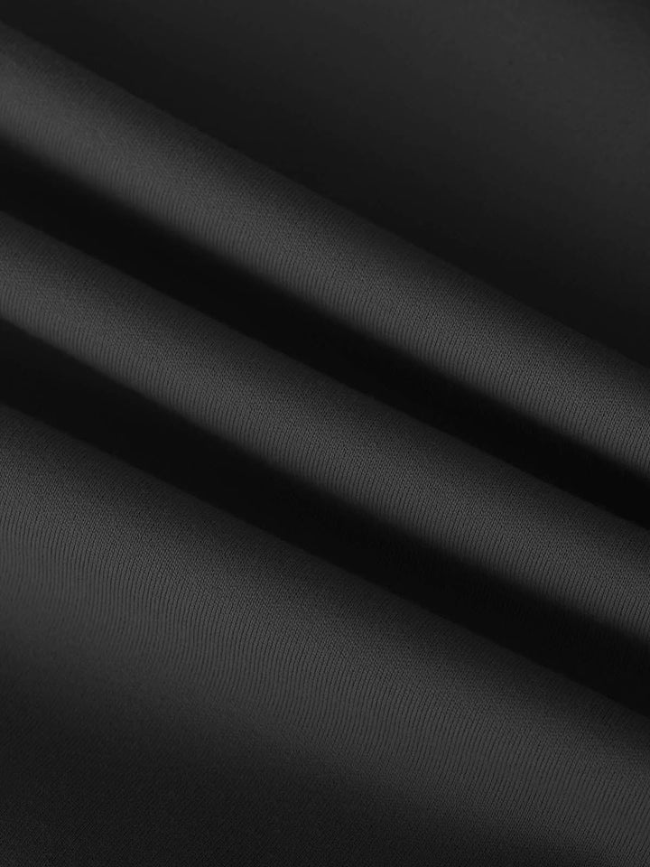 A model wearing a BRXL® Side Pocket Butt-Lift Leggings in