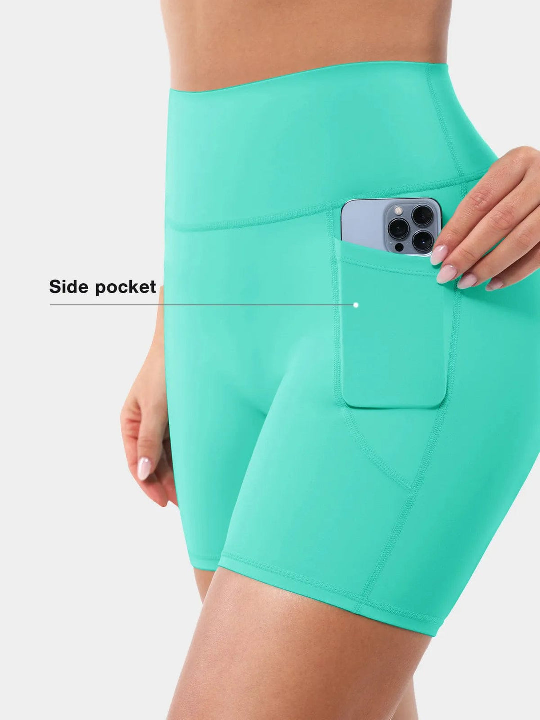 A model wearing a BRXL® Sports Bra Sculpted Shorts Sculpted Leggings Set in