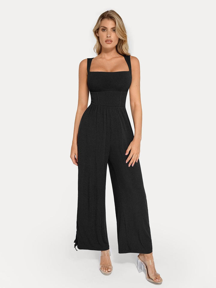 Black shapewear jumpsuit with square neckline, wide leg, and adjustable tie detail on the hem.
