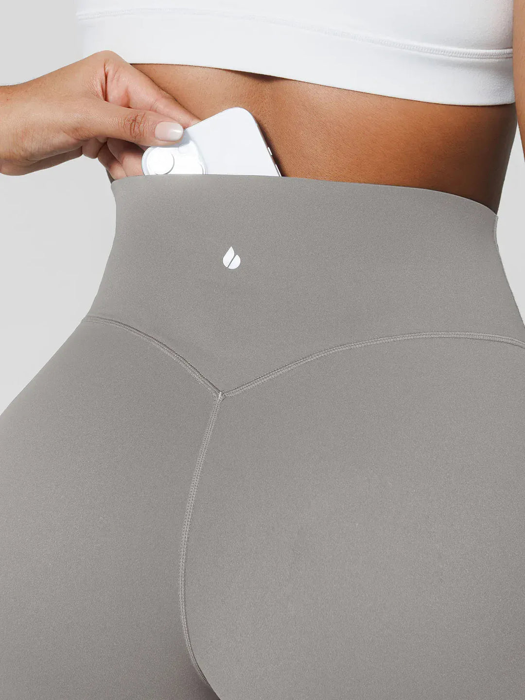 A model wearing a BRXL® Tummy Control Wide Leg Activewear Leggings in