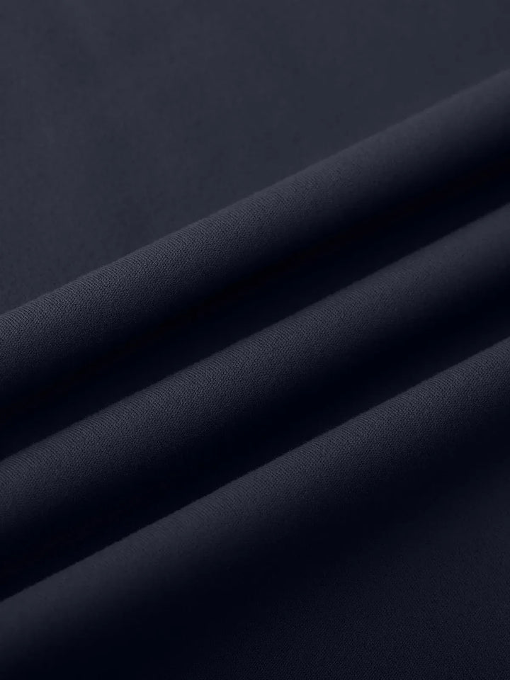 A model wearing a BRXL® Tummy Control Wide Leg Activewear Leggings in