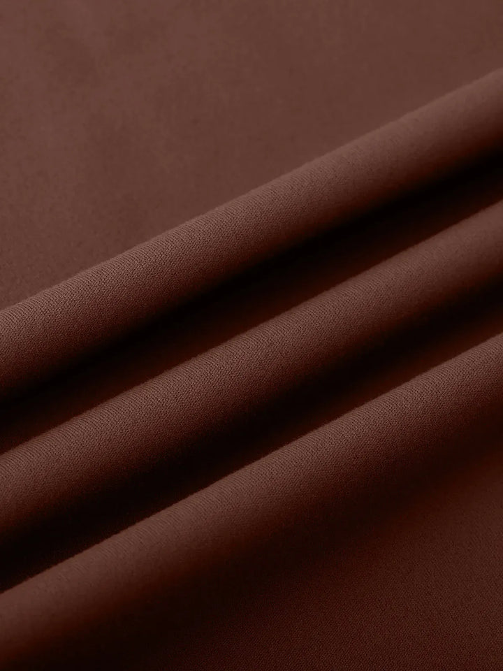 A model wearing a BRXL® Tummy Control Wide Leg Activewear Leggings in