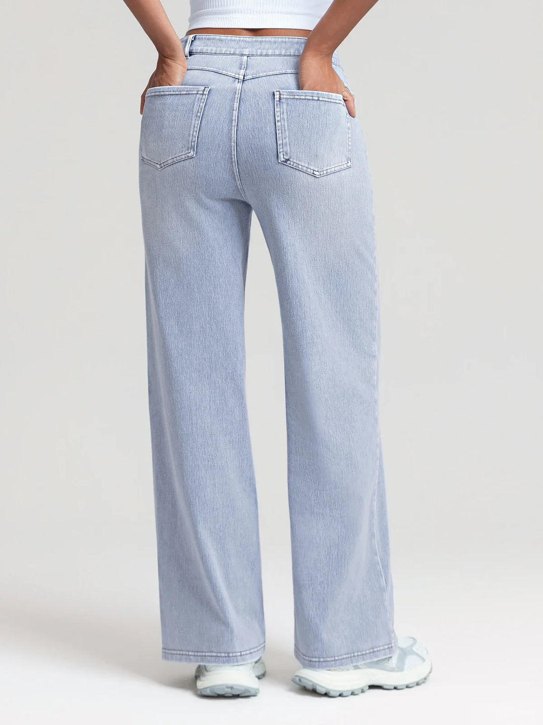 A model wearing a BRXL® V-Waist Butt-Lifting Washed Casual Wide Leg Jeans with Pockets
