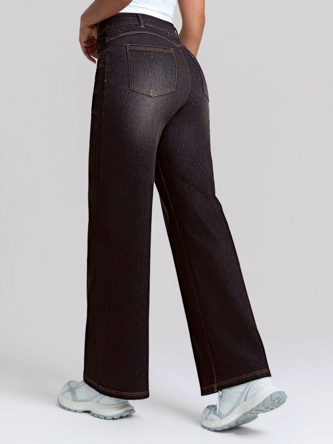 A model wearing a BRXL® V-Waist Butt-Lifting Washed Casual Wide Leg Jeans with Pockets