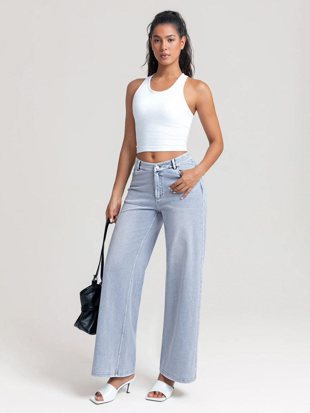A model wearing a BRXL® V-Waist Butt-Lifting Washed Casual Wide Leg Jeans with Pockets