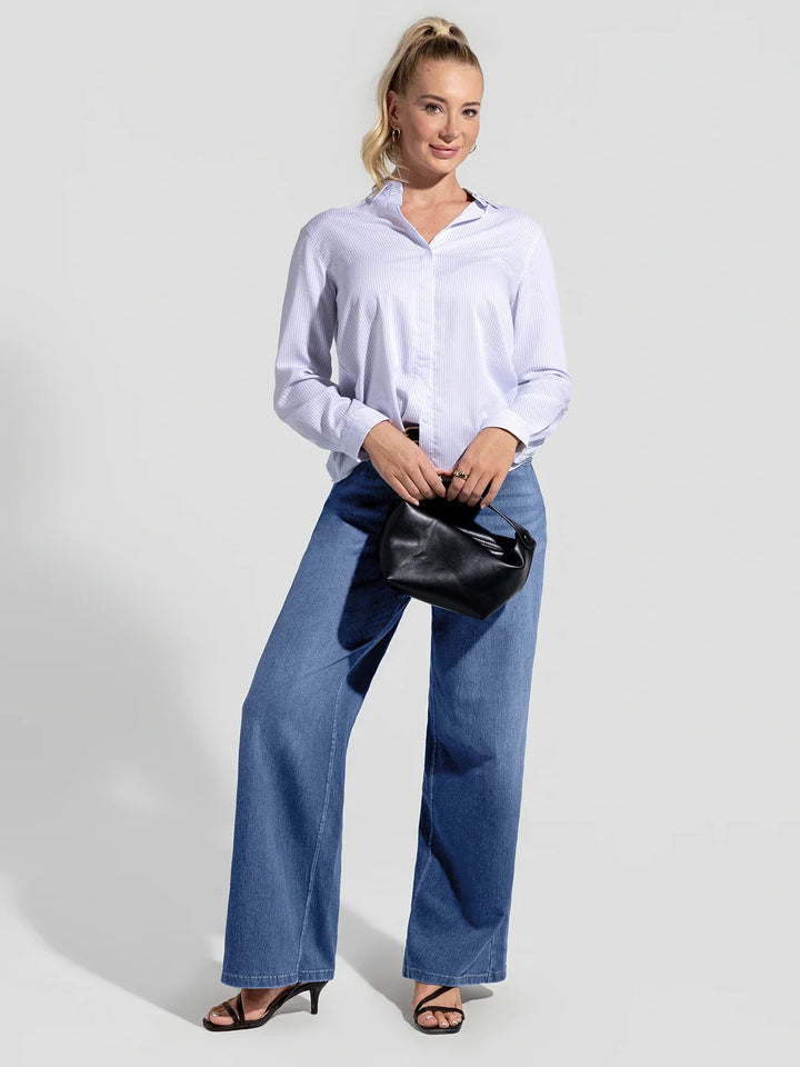A model wearing a BRXL® V-Waist Butt-Lifting Washed Casual Wide Leg Jeans with Pockets