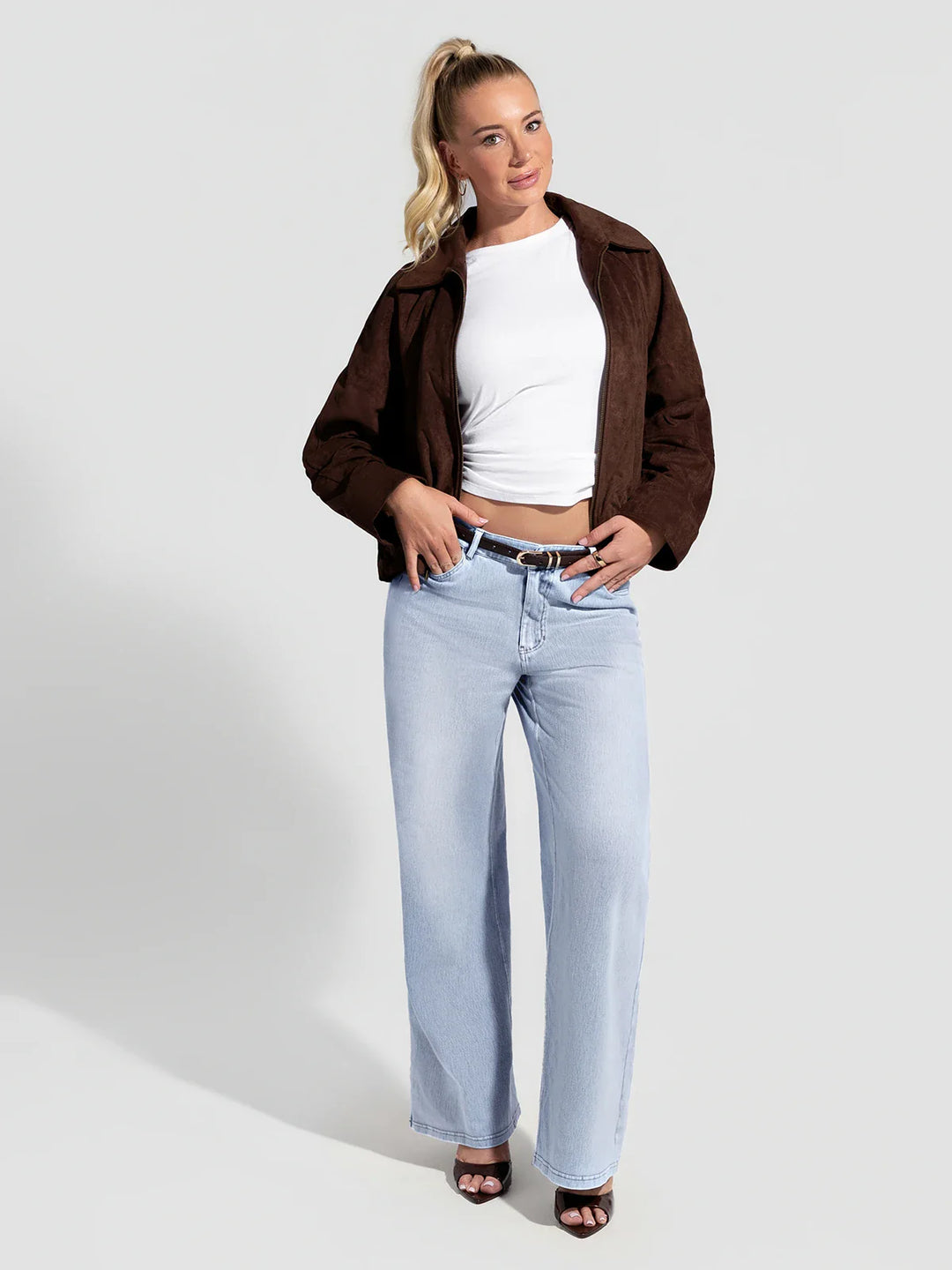 A model wearing a BRXL® V-Waist Butt-Lifting Washed Casual Wide Leg Jeans with Pockets