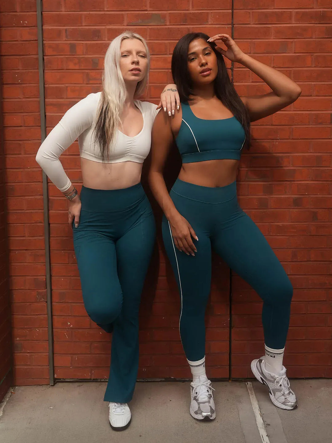 A model wearing a BRXL® Wide Strap Yoga-Friendly Sports Bra