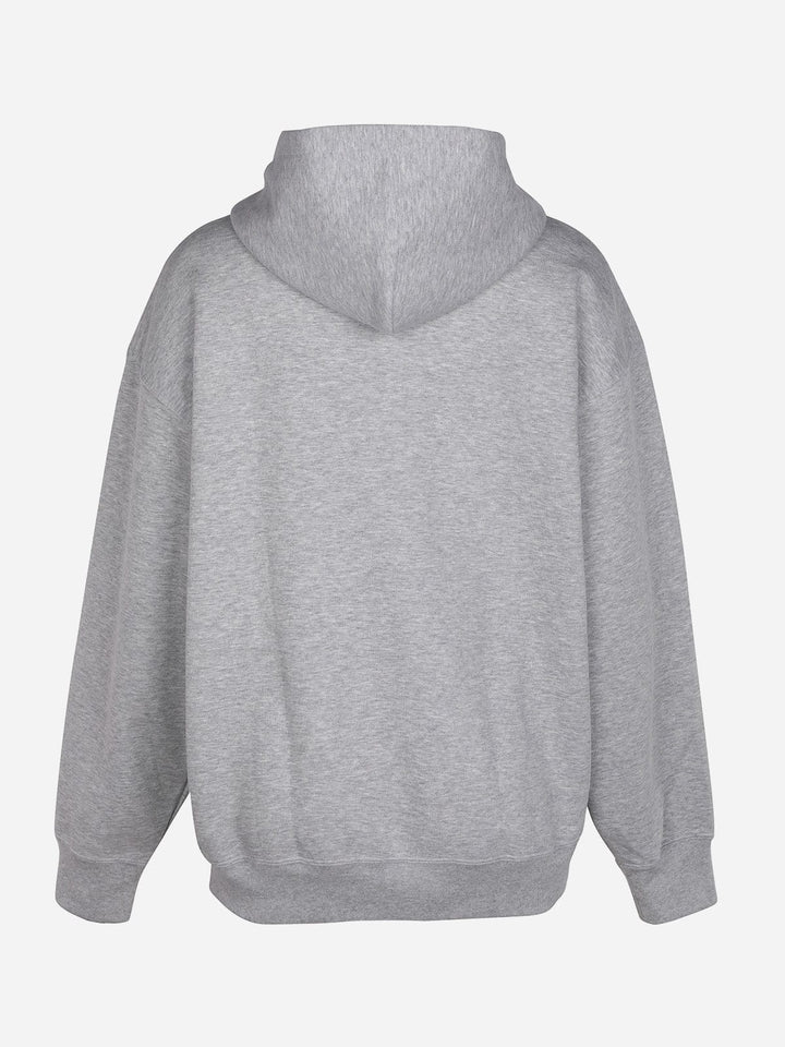 A model wearing a OTHERS Oversized Hooded Pullover Fleece Hoodie
